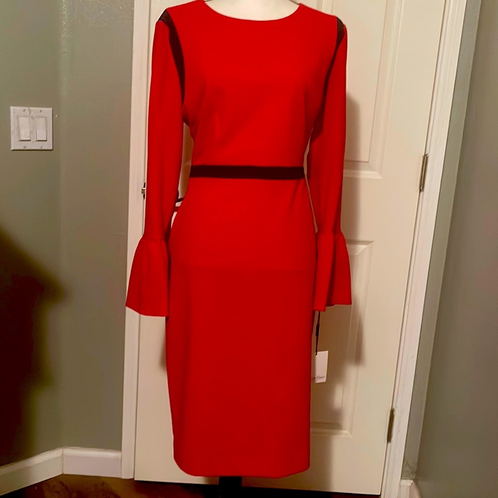 Calvin Klein dress red size 14 never worn 94% polyester and 6% Rayon.